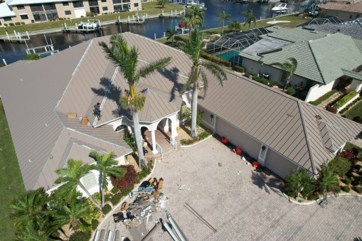 Brown Tin Roof on Home from a Residential Roofing Contractor in Fort Lauderdale