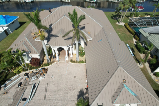 Brown Tin Roof on Home from a Residential Roofing Contractor in Fort Lauderdale