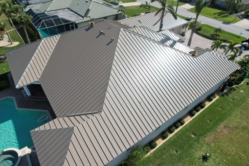 Brown Tin Roof on Home from a Residential Roofing Contractor in Fort Lauderdale