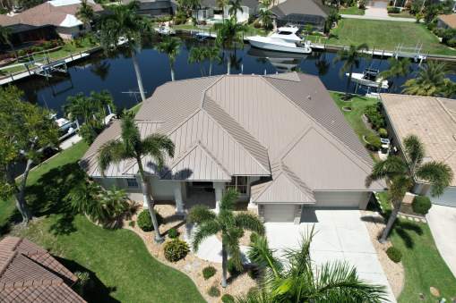Brown Tin Roof on Home from a Residential Roofing Contractor in Fort Lauderdale