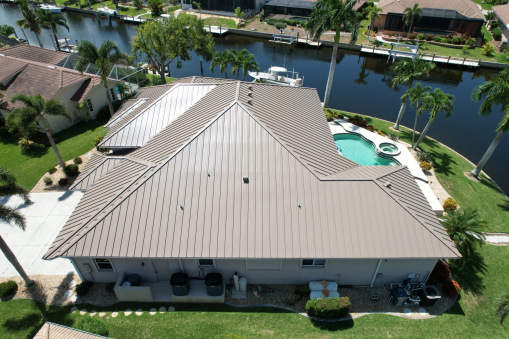 Brown Tin Roof on Home from a Residential Roofing Contractor in Fort Lauderdale