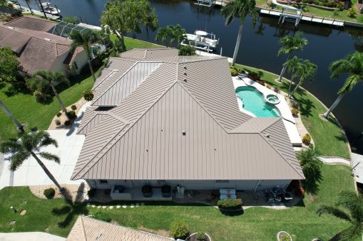 Brown Tin Roof on Home from a Residential Roofing Contractor in Fort Lauderdale