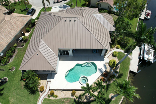 Brown Tin Roof on Home from a Residential Roofing Contractor in Fort Lauderdale