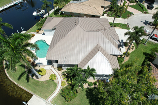 Brown Tin Roof on Home from a Residential Roofing Contractor in Fort Lauderdale