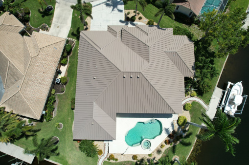 Brown Tin Roof on Home from a Residential Roofing Contractor in Fort Lauderdale