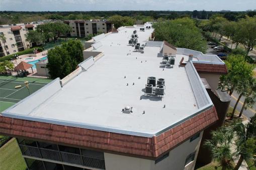 Hot Asphalt After Commercial Reroofing on Apartment Building in Lauderhill, FL