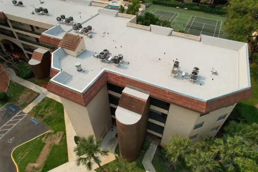 Hot Asphalt After Commercial Reroofing on Apartment Building in Lauderhill, FL