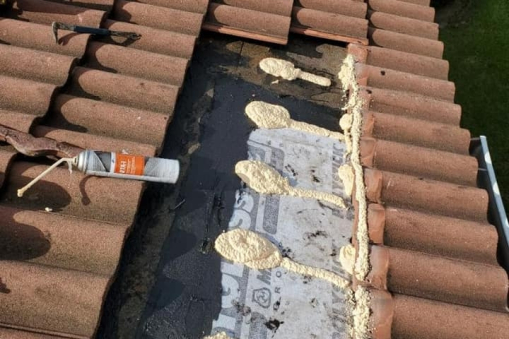 Progress of Installing Tile on Roof from a Commercial Roofing Contractor in Sunrise, FL