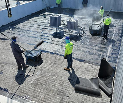 Commercial Roofing Contractors Working on Reroofing in Fort Lauderdale, FL