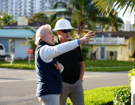 Men Discussing Roof Inspection for 2025 New Florida Condo HOA Law: Condo and HOA Roof Inspections in Broward County, Fort Lauderdale, Pompano Beach, Hollywood, FL